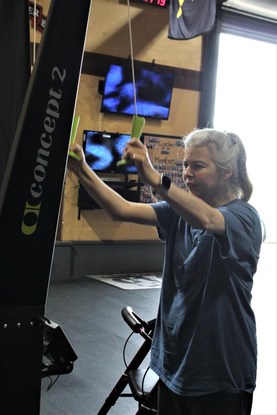 Angie Dusty, a Muldrow resident, participates in the spinal cord injury class at CrossFit Fort Smith May 26.