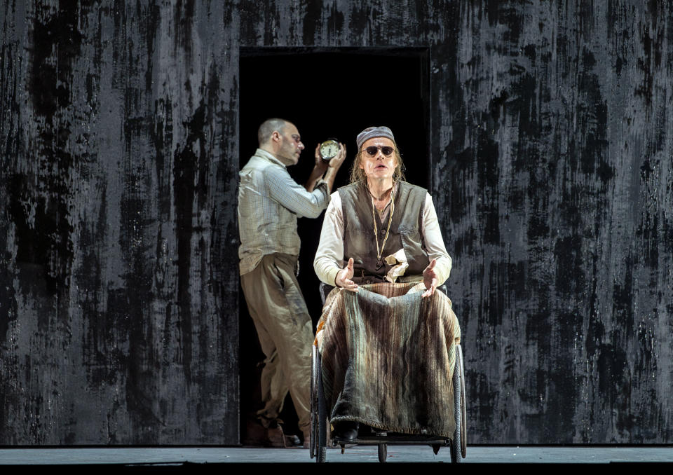 In this photo taken on Nov. 11, 2018 Leigh Melrose, left, and Frode Olsen perform during rehearsals of Gyoergy Kurtag's opera 'Fin de Partie' at the Milan La Scala opera house, Italy. The long-awaited premiere of composer Georgy Kurtag's first-ever opera at Milan's La Scala opera house, based on a Beckett play, ''Fin de Partie'' is being billed as the most important opera premiere of the last 50 years and it is scheduled to go on stage Thursday, Nov. 15, 2018. (Ruth Walz via AP)