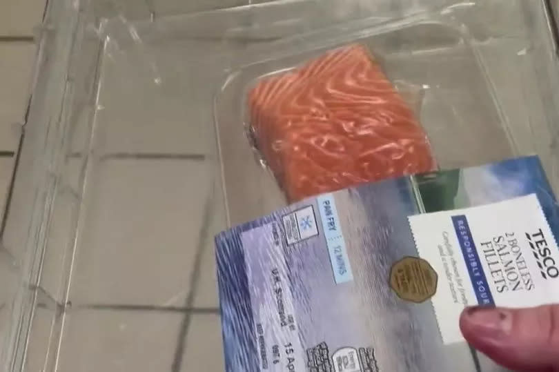 Pictured: Tesco salmon in a security box