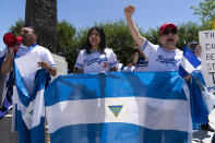 Nicaragua supporters protest outside of the Organization of the American States asking to free political prisioners and stop the government's human rights violations against critics, during a rally in Washington, Wednesday, June 23, 2021. (AP Photo/Jose Luis Magana)