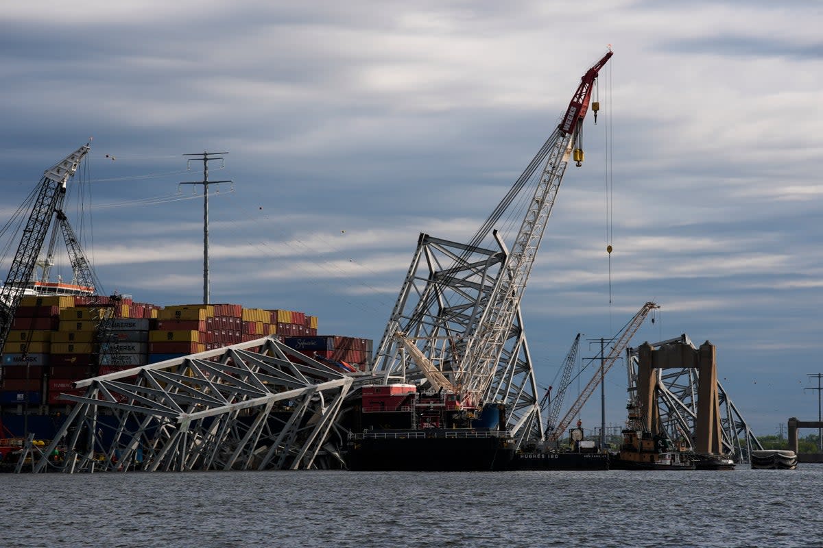 Work continues at the site of the collapsed Francis Scott Key Bridge in Baltimore, Maryland. State officials revealed that the cost to replace the bridge will be between $1.7bn and $1.9bn (Copyright 2024 The Associated Press. All rights reserved.)