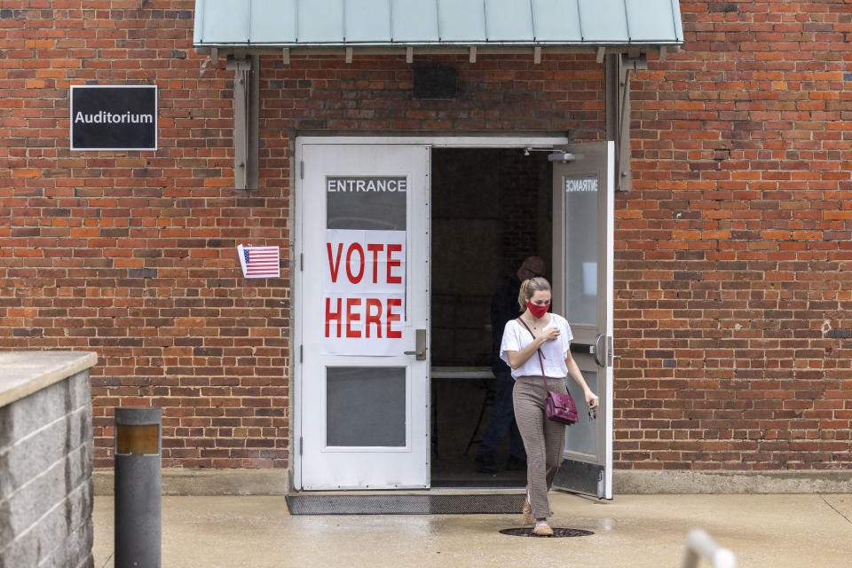 A voter departs the Tuscaloosa County Courthouse Annex, Ward 28 for Tuscaloosa County, during a primary election, Tuesday, March 5, 2024, in Tuscaloosa, Ala. (AP Photo/Vasha Hunt)