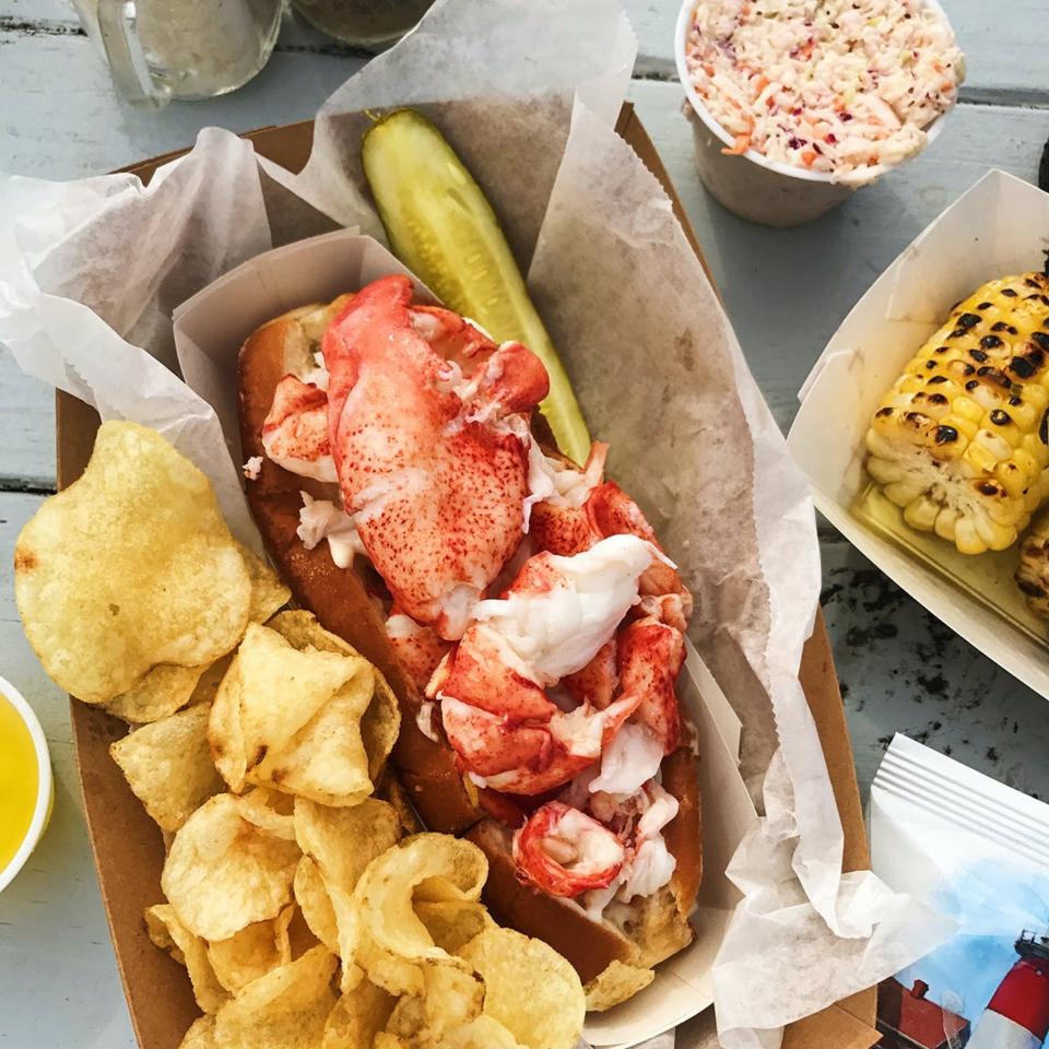 This image released by Goldbelly shows a lobster roll from McLoons Lobster Shack in Maine. (Goldbelly via AP)