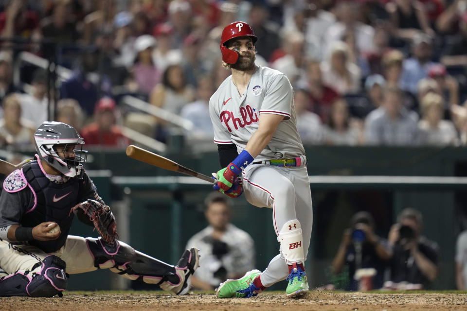 Philadelphia Phillies' Bryce Harper strikes out swinging in the ninth inning of a baseball game against the Washington Nationals, Friday, June 2, 2023, in Washington. (AP Photo/Patrick Semansky)