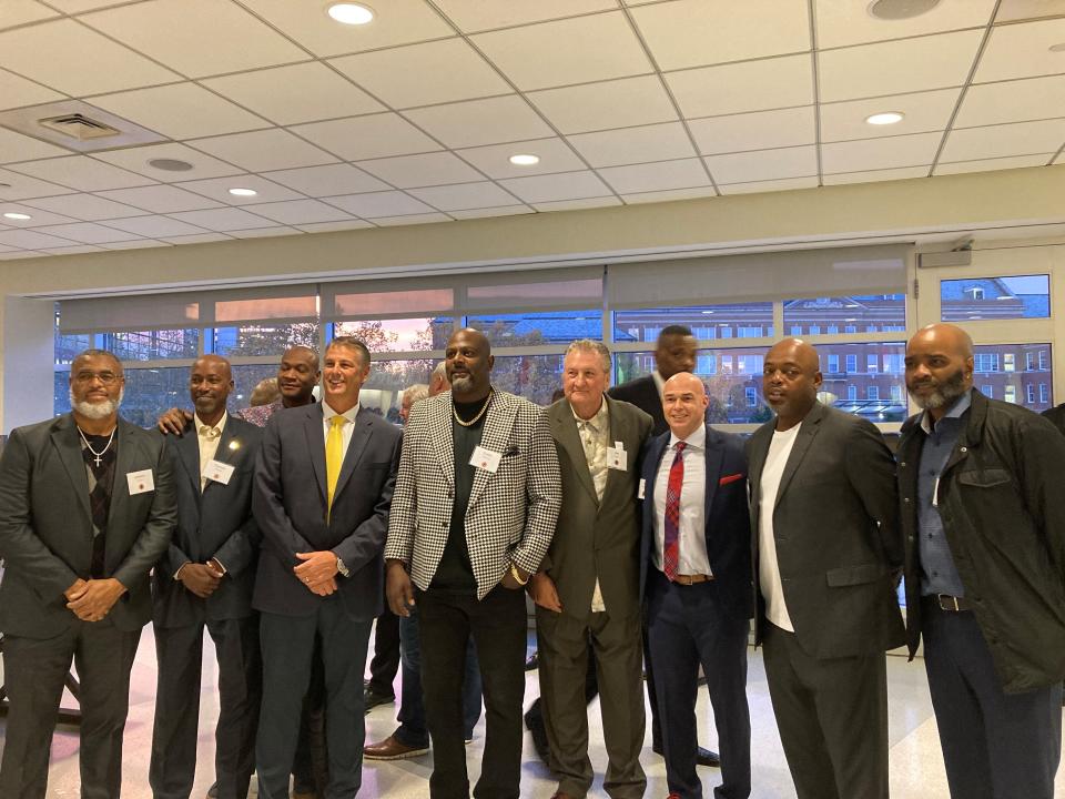 Former UC Bearcat coach Bob Huggins attended the induction of Corie Blount into the UC Athletic Hall of Fame. From left are former Bearcats Anthony Buford, Tarrice Gibson, Curtis Bostic, Keith Gregor, Terry Nelson, Huggins, Alex Meacham, Nick Van Exel and A.D. Jackson.