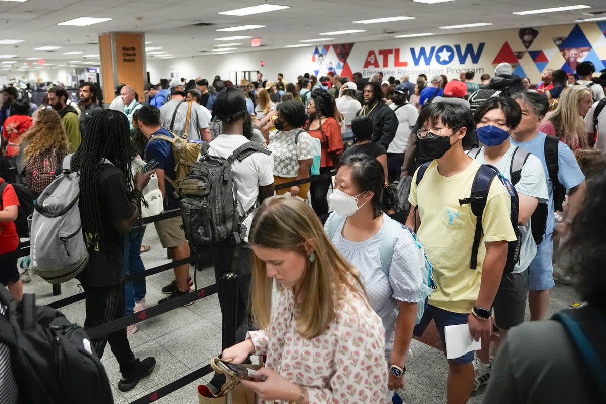 More than 32 million people are expected to pass through the nation’s airports during the July 4 holiday season  (AP)