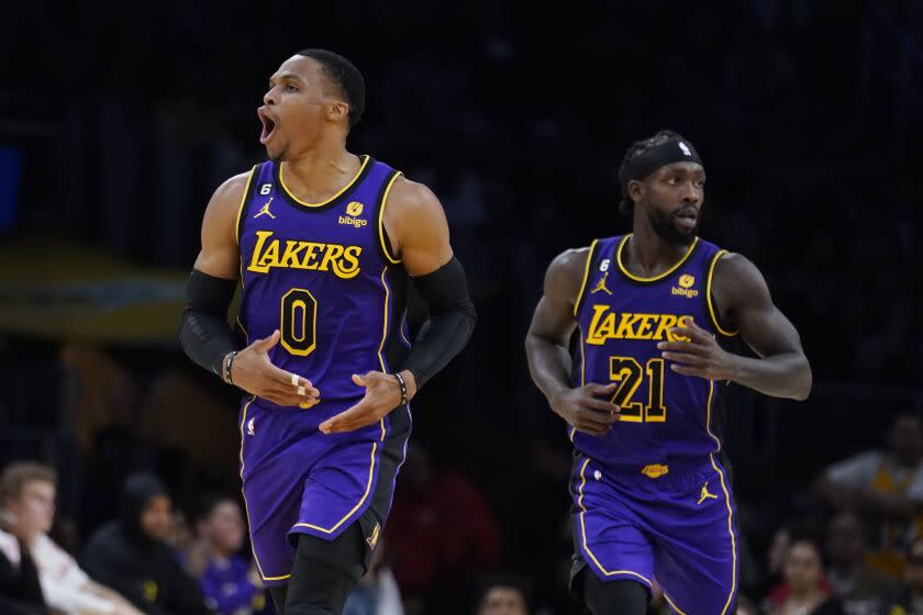 Los Angeles Lakers guard Russell Westbrook (0) reacts after scoring against the Utah Jazz.