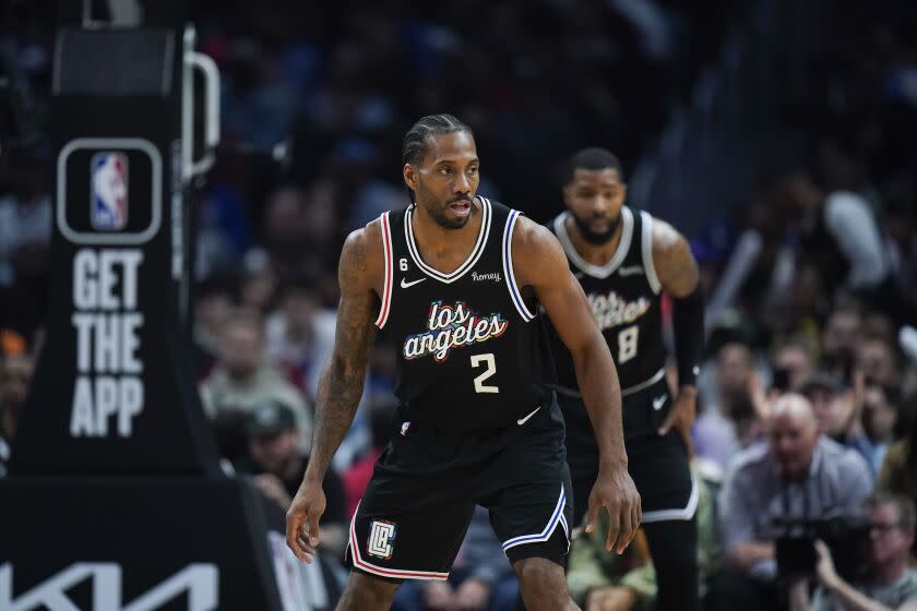 Los Angeles Clippers' Kawhi Leonard defends during second half of an NBA basketball game against the Toronto Raptors Wednesday, March 8, 2023, in Los Angeles. (AP Photo/Jae C. Hong)