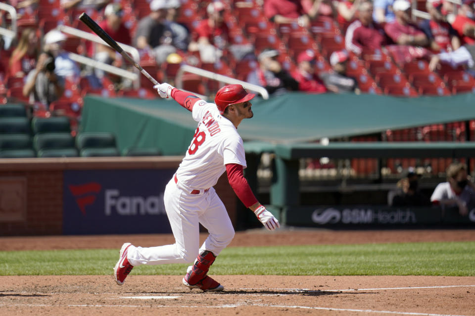 St. Louis Cardinals' Nolan Arenado doubles during the sixth inning of a baseball game against the Washington Nationals Wednesday, April 14, 2021, in St. Louis. (AP Photo/Jeff Roberson)