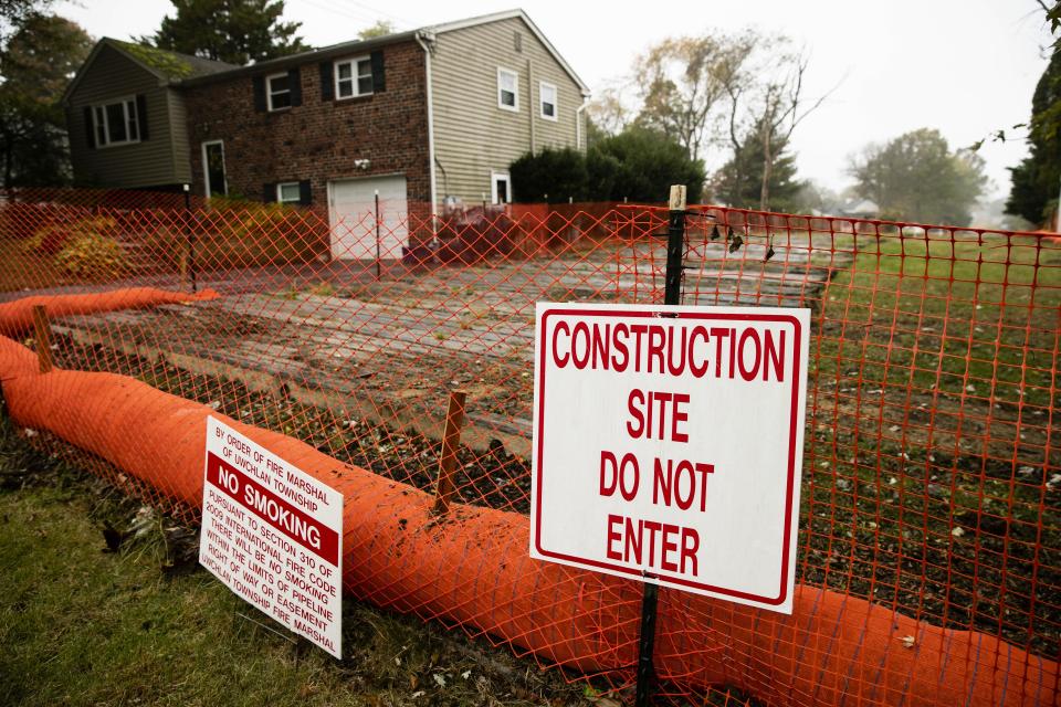 A sign is posted at a construction site on the Mariner East pipeline in a residential neighborhood in Exton, Pa.