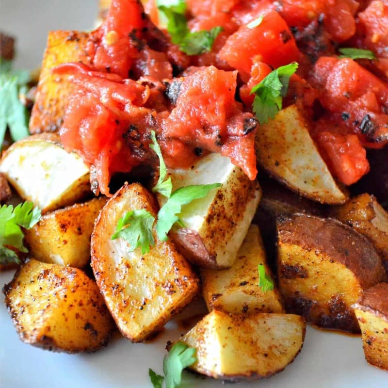 <p>Vegan in the Freezer</p><p>Roasted red potatoes are easy to make and when they are roasted with added spices that pack some heat you get something special.</p><p><strong>Get the recipe: <a href="https://veganinthefreezer.com/roasted-red-potatoes/" rel="nofollow noopener" target="_blank" data-ylk="slk:Spicy Roasted Red Potatoes;elm:context_link;itc:0;sec:content-canvas" class="link rapid-noclick-resp">Spicy Roasted Red Potatoes</a></strong></p><p><strong>Related: <a href="https://parade.com/1010754/kristamarshall/easy-tater-tot-recipes/" rel="nofollow noopener" target="_blank" data-ylk="slk:30 Best Tater Tot Recipes;elm:context_link;itc:0;sec:content-canvas" class="link rapid-noclick-resp">30 Best Tater Tot Recipes</a></strong></p>