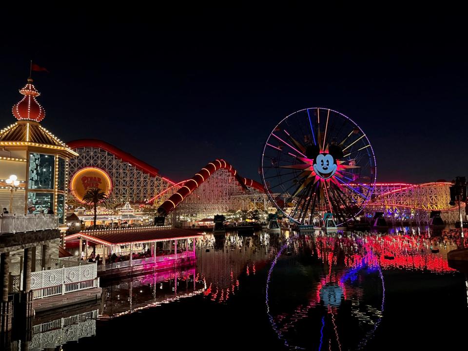 Disney California Adventure Park's Pixar Pier glows at night.