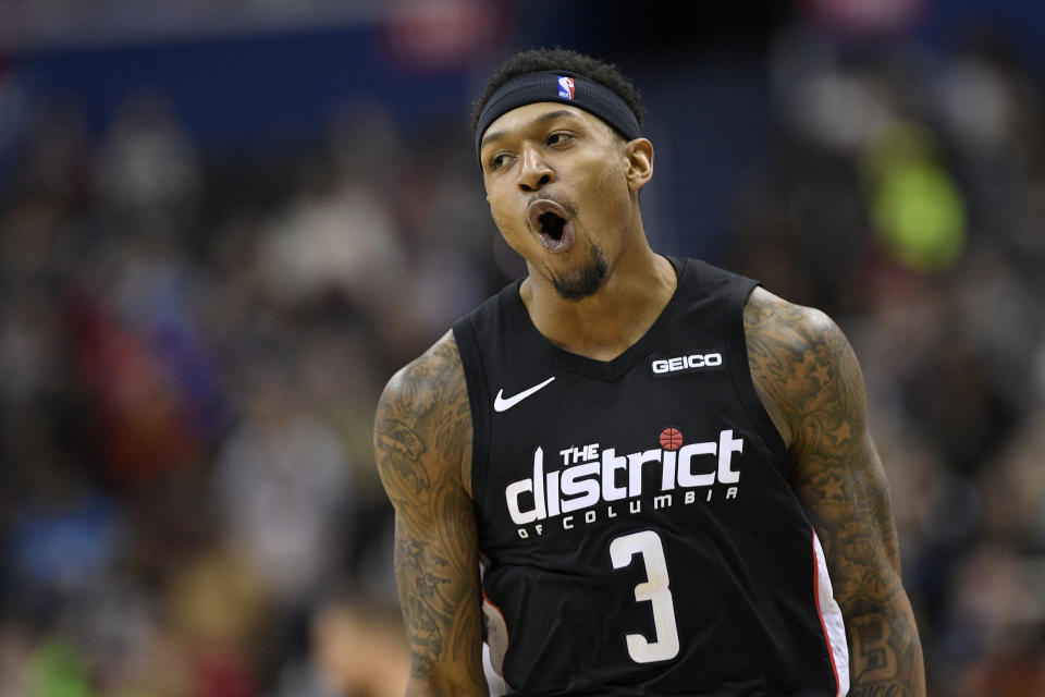 Washington Wizards guard Bradley Beal (3) reacts after he made a basket during the second half of an NBA basketball game against the Memphis Grizzlies, Saturday, March 16, 2019, in Washington. The Wizards won 135-128. (AP Photo/Nick Wass)