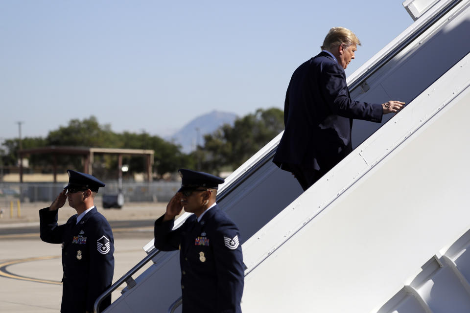 President Donald Trump boards Air Force One at Albuquerque International Sunport, Tuesday, Sept. 17, 2019, in Albuquerque, N.M. (AP Photo/Evan Vucci)