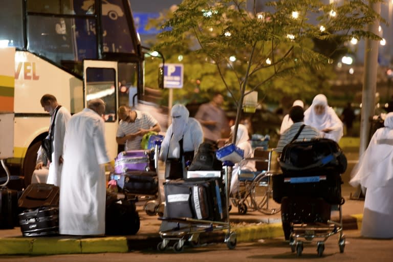 Men wear seamless white clothing and women wear modest clothing en route and while performing the hajj