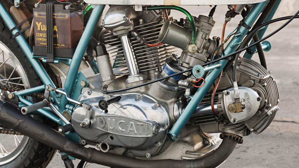 A close-up of the 748 cc, 90-degree L-twin engine in a 1972 Ducati 750 Imola Desmo motorcycle.