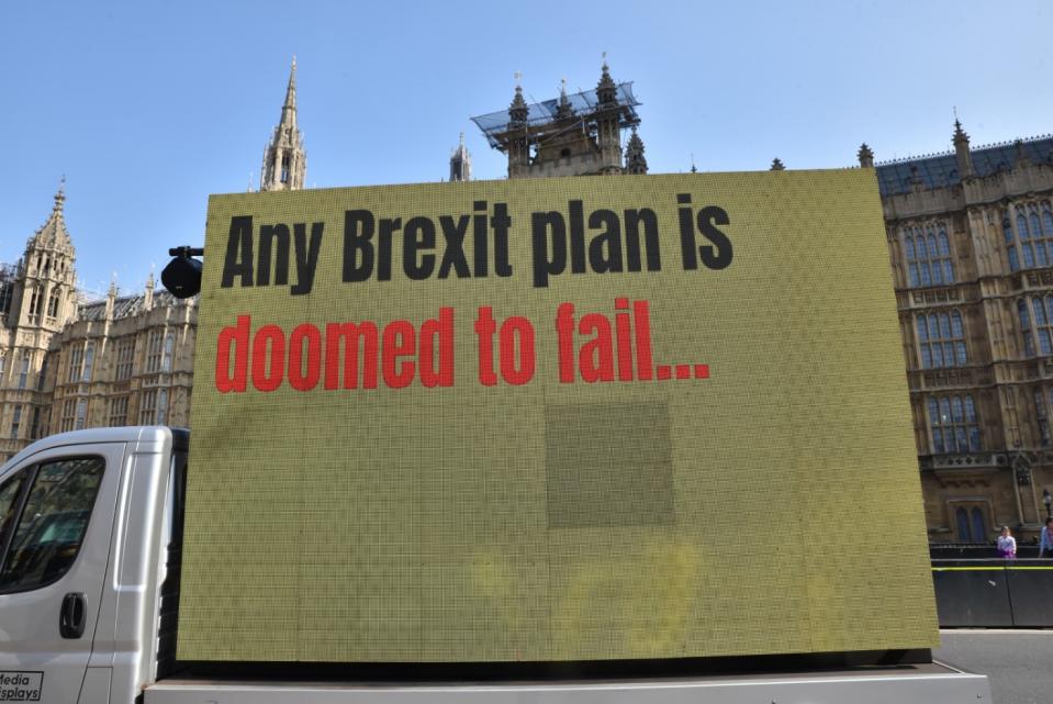 <p>A loud and proud pro-Brexit sign outside Westminster (GETTY) </p>