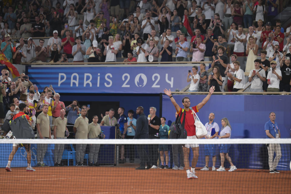 PARIS, FRANCE - JULY 31: Austin Krajicek and Rajeev Ram of US celebrate after defeating Rafael Nadal of Spain playing with Carlos Alcaraz of Spain in their men's doubles quarter-final tennis match on Court Philippe-Chatrier at the Roland-Garros Stadium during the Olympic Games Paris 2024 on July 31, 2024, in Paris, France. (Photo by Mehmet Murat Onel/Anadolu via Getty Images)