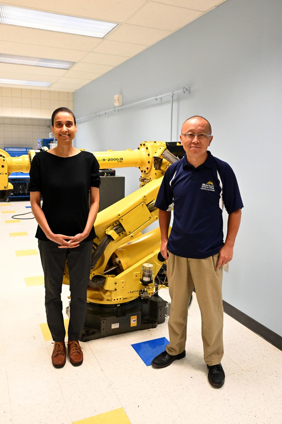Dr. Elizabeth Azhikannickal, director of engineering technologies, and Dr. Feng Hua, associate professor of engineering, in an engineering lab.