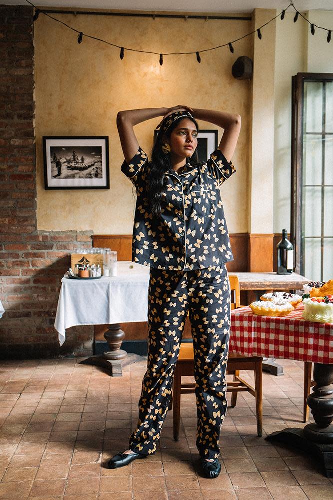 <p>It's possible her pajama collection is well stocked, but considering we're still indoors, it won't hurt to have another, quirky pair. Especially when they look as yummy as this Farfalle-printed set.</p>