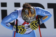 A tiger is depicted on the helmet of Italy's Federica Brignone at the finish area of an alpine ski, women's World Championships super G, in Meribel, France, Wednesday, Feb. 8, 2023. (AP Photo/Marco Trovati)