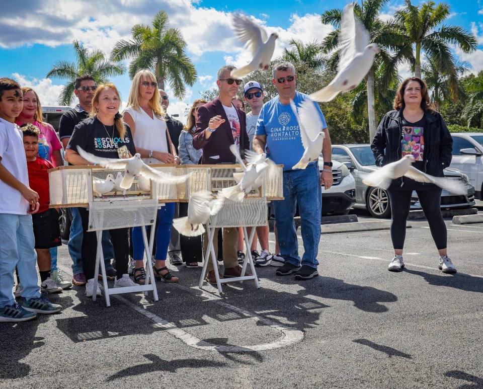 Seventeen doves are released by family members during a remembrance ceremony in Coral Springs on Wednesday for the victims of the 2018 Margaret Stoneman Douglas High School shooting.