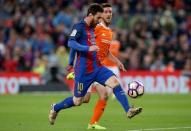 Football Soccer- Spanish La Liga Santander - Barcelona v Osasuna - Camp Nou stadium, Barcelona, Spain - 26/04/17 Barcelona's Lionel Messi scores a goal. REUTERS/Albert Gea