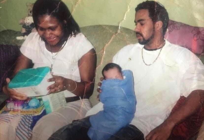 Toshira Garrawa, her fiance, who she says was killed by police in 2009, and their son.