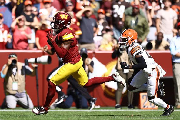 LANDOVER, MARYLAND – OCTOBER 06: Terry McLaurin #17 of the Washington Commanders makes a reception against Denzel Ward #21 of the Cleveland Browns in the first quarter of the game at Northwest Stadium on October 06, 2024 in Landover, Maryland. (Photo by Timothy Nwachukwu/Getty Images)