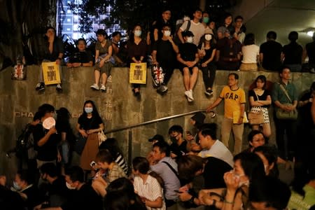 Protesters attend a "Stand With Hong Kong, Power to the People Rally" at the Chater Garden, in Hong Kong