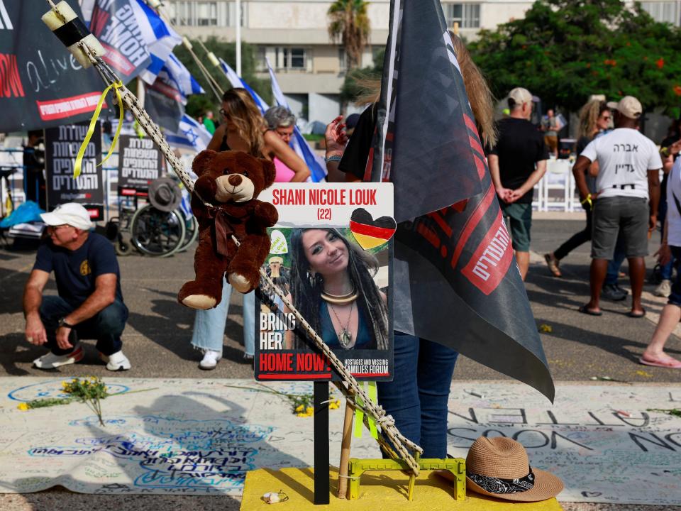 A picture of Shani Nicole Louk is displayed during a demonstration by family members and supporters of hostages who are being held in Gaza after they were kidnapped from Israel by Hamas gunmen.