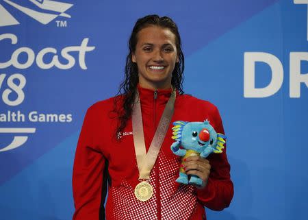 Swimming - Gold Coast 2018 Commonwealth Games - Women's 200m Backstroke - Optus Aquatic Centre - Gold Coast, Australia - April 8, 2018. Gold medalist Kylie Masse of Canada poses. REUTERS/David Gray