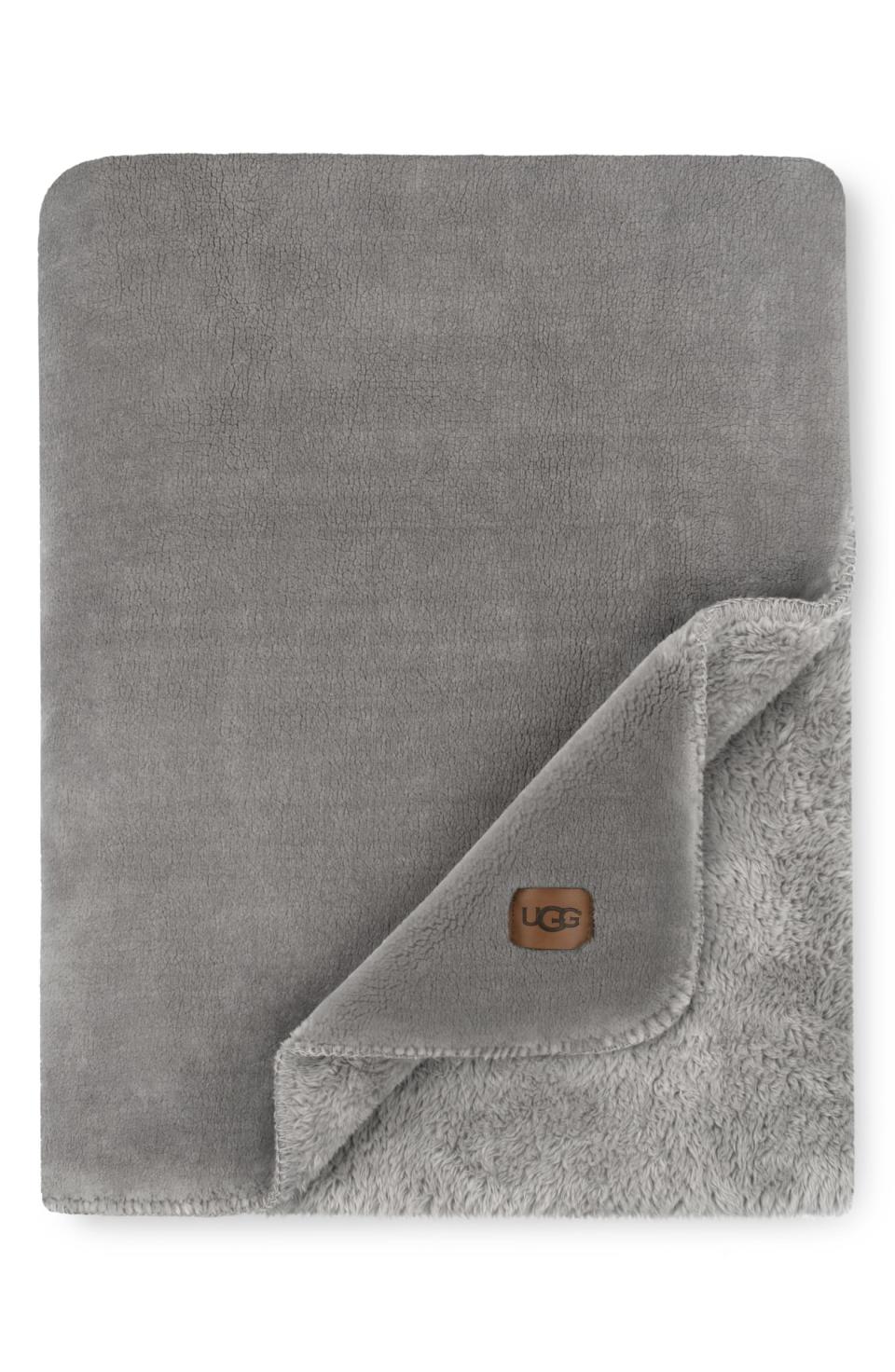 Ugg Whistler Throw Blanket. Image via Nordstrom.