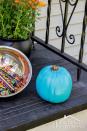 <p>Turquoise is more in season than you think. The color signals trick-or-treaters with food allergies that a house provides alternative treats as part of <a href="https://www.goodhousekeeping.com/holidays/halloween-ideas/a25868/teal-pumpkin-project/" rel="nofollow noopener" target="_blank" data-ylk="slk:The Teal Pumpkin Project;elm:context_link;itc:0;sec:content-canvas" class="link ">The Teal Pumpkin Project</a>.</p><p><a class="link " href="https://www.amazon.com/Rust-Oleum-257461-Painters-12-Ounce-Lagoon/dp/B006ZHJX78/ref=sr_1_5?tag=syn-yahoo-20&ascsubtag=%5Bartid%7C10055.g.1714%5Bsrc%7Cyahoo-us" rel="nofollow noopener" target="_blank" data-ylk="slk:SHOP TEAL PAINT;elm:context_link;itc:0;sec:content-canvas">SHOP TEAL PAINT</a><br></p><p><em><a href="http://www.practicallyfunctional.com/teal-pumpkin-project-halloween/#_a5y_p=2717596" rel="nofollow noopener" target="_blank" data-ylk="slk:Get the tutorial at Practically Functional »;elm:context_link;itc:0;sec:content-canvas" class="link ">Get the tutorial at Practically Functional »</a></em></p>