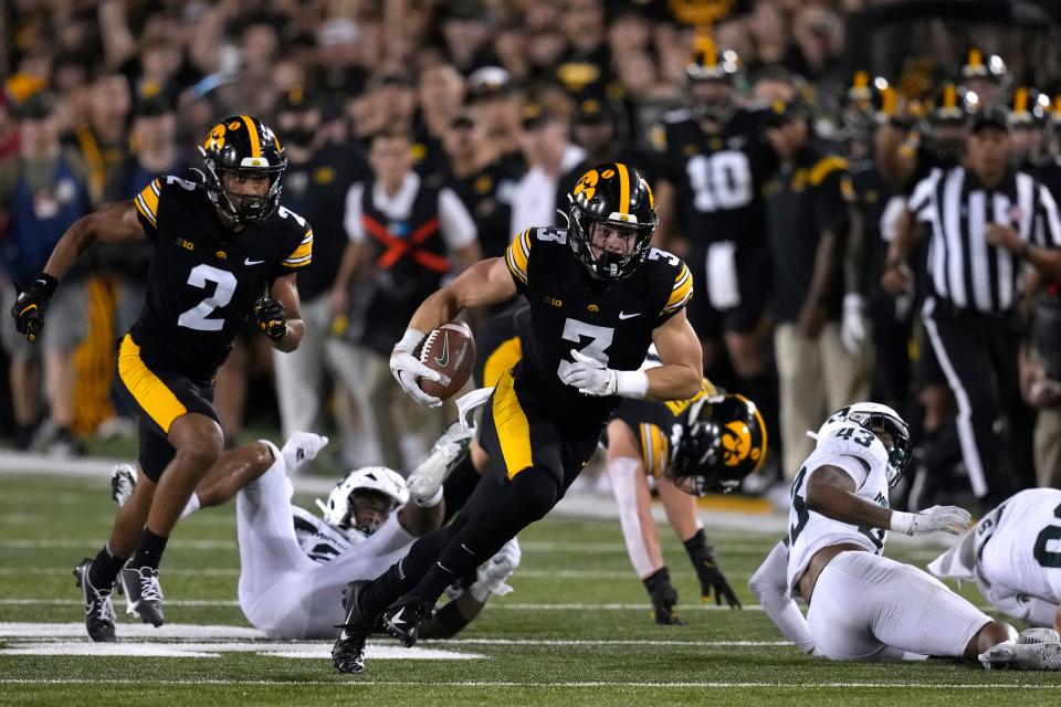 Iowa defensive back Cooper DeJean returns a punt 70-yards for a touchdown during the second half of MSU's 26-16 loss Saturday, Sept. 30, 2023, in Iowa City, Iowa.