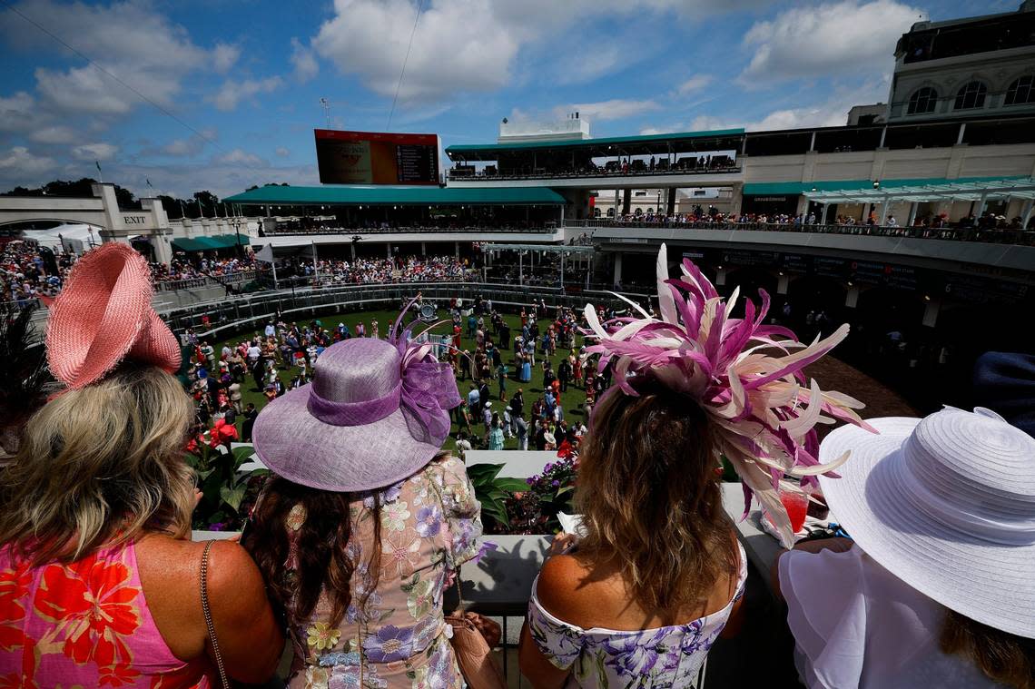 Spectators overlook the paddock early in the day ahead of the 150th running of the Kentucky Derby at Churchill Downs on Saturday. Alex Slitz