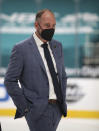 FILE - Vegas Golden Knights coach Peter DeBoer leaves the ice at the end of the first period during an NHL hockey game against the San Jose Sharks in San Jose, Calif., in this Saturday, Feb. 13, 2021, file photo. The four coaches left in the NHL playoffs have connections to each other, but they all took different paths to get to this point. (AP Photo/Josie Lepe, File)
