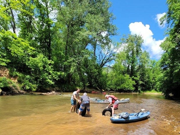 Volunteers cleaned four miles of the First Broad River.