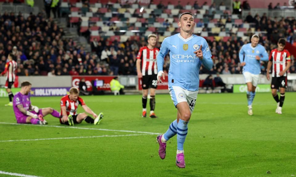 <span>Phil Foden celebrates after completing his hat-trick.</span><span>Photograph: David Klein/Reuters</span>