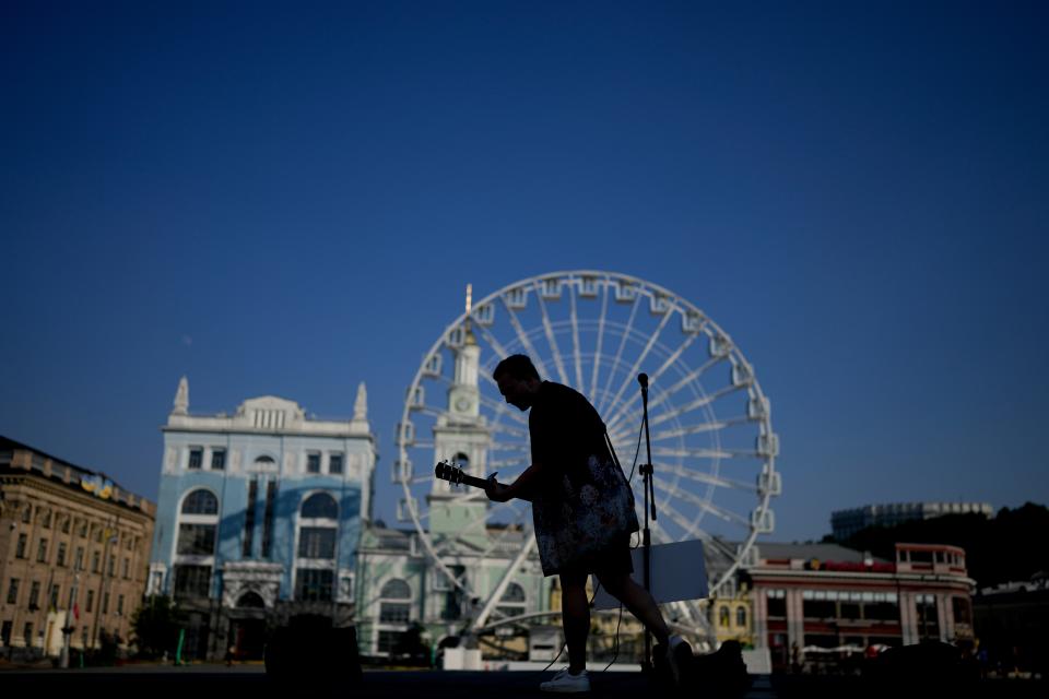 A street musician performs on Friday in Kyiv, Ukraine.