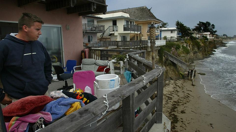 John Bruno, 20, a UCSB student, looks down from the cliffs at the scene of a fatal fall