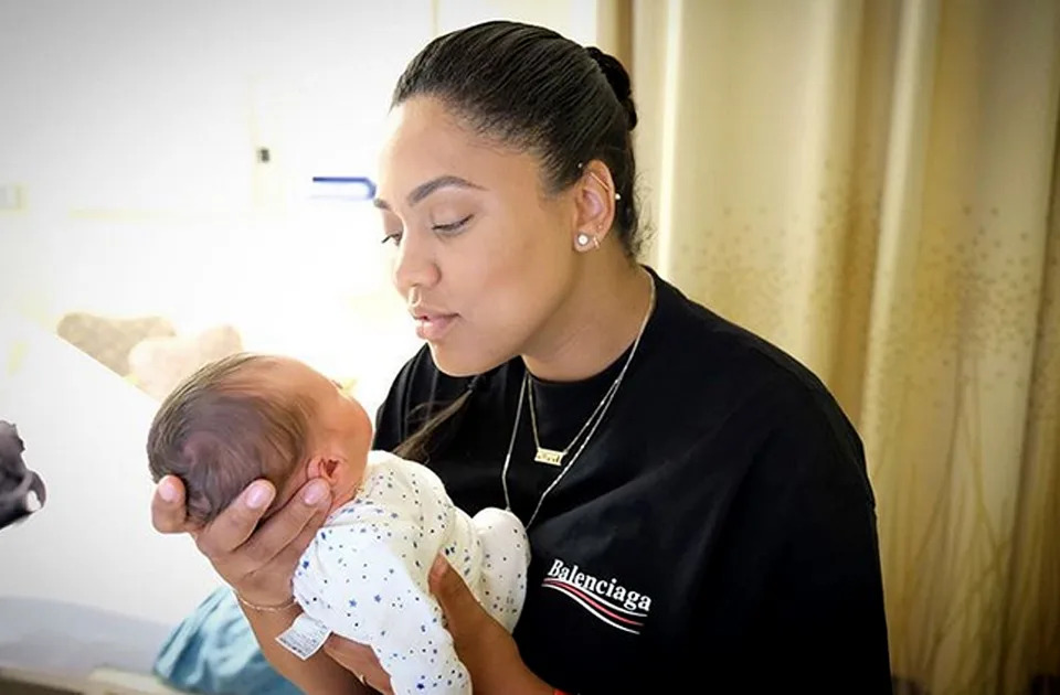 <p>Ayesha welcomed her third baby with Stephen, son <a href="https://people.com/parents/stephen-curry-ayesha-welcome-son-canon-w-jack/" rel="nofollow noopener" target="_blank" data-ylk="slk:Canon;elm:context_link;itc:0" class="link ">Canon</a>, on July 4, 2018. She shared a heartwarming photo on <a href="https://www.instagram.com/p/Bk3zDHJg6nu/?taken-by=ayeshacurry" rel="nofollow noopener" target="_blank" data-ylk="slk:Instagram;elm:context_link;itc:0" class="link ">Instagram</a> of her holding the newborn a day after his birth.</p> <p>"Pure bliss. Rare photo of me and my new man sharing an intimate moment. 😆😍 I'm so in love. <a href="https://www.instagram.com/explore/tags/isthisreallife/" rel="nofollow noopener" target="_blank" data-ylk="slk:#isthisreallife;elm:context_link;itc:0" class="link ">#isthisreallife</a> <a href="https://www.instagram.com/explore/tags/pinchmenow/" rel="nofollow noopener" target="_blank" data-ylk="slk:#pinchmenow;elm:context_link;itc:0" class="link ">#pinchmenow</a>" she wrote.</p>