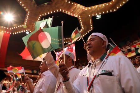 Members of UMNO and PAS gather during the Ummah Unity Gathering in Kuala Lumpur