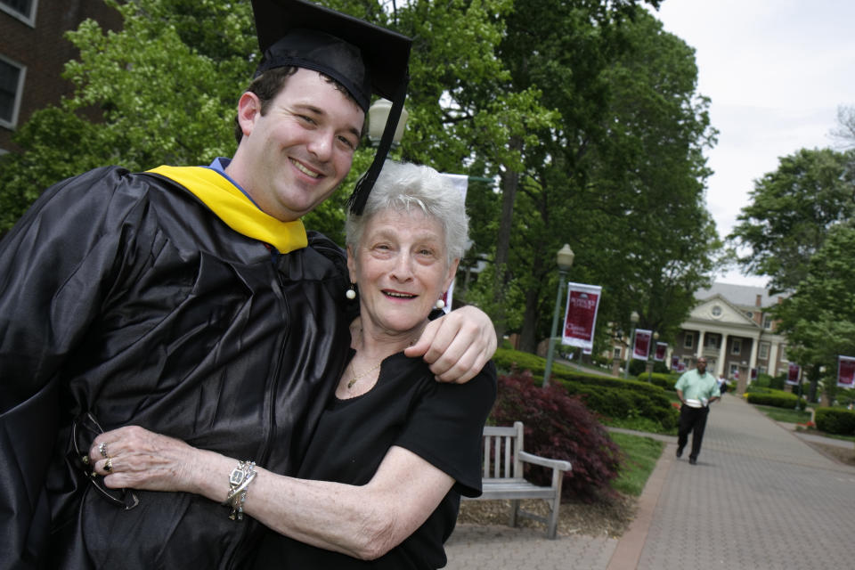 A grandmother hugs her grandson on his graduation day at Roanoke College. (Photo by: Jeffrey Greenberg/Universal Images Group via Getty Images)