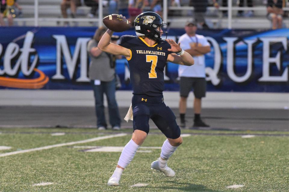 Stephenville quarterback Ryder Lambert (7) throws a pass during Friday's game against Wylie at Tarleton Memorial Stadium in Stephenville on Sept. 17. The Yellow Jackets will face an 12-1 Melissa team in their regional final game.