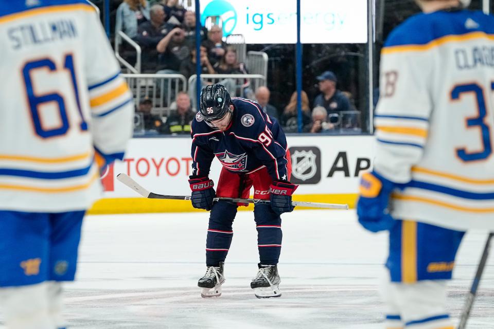Columbus Blue Jackets center Jack Roslovic (96) react to a goal by Buffalo Sabres center Casey Mittelstadt (37) during the third period of the NHL hockey game at Nationwide Arena in Columbus on April 14, 2023. The Blue Jackets lost 5-2.