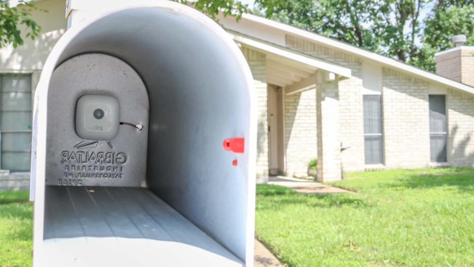 A Ring Mailbox Sensor installed at the back of a mailbox