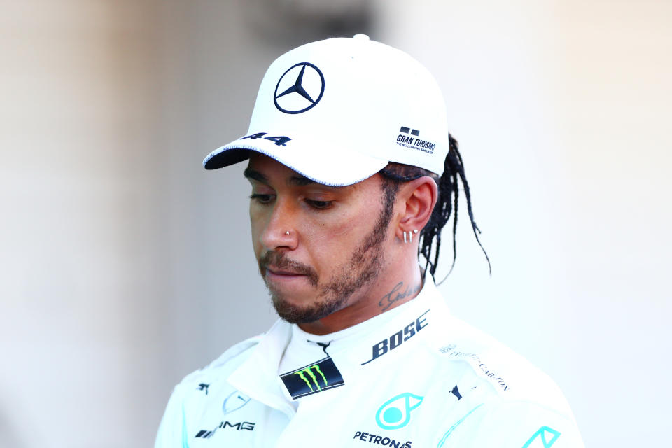 SUZUKA, JAPAN - OCTOBER 13: Third placed Lewis Hamilton of Great Britain and Mercedes GP looks dejected in parc ferme during the F1 Grand Prix of Japan at Suzuka Circuit on October 13, 2019 in Suzuka, Japan. (Photo by Dan Istitene/Getty Images)