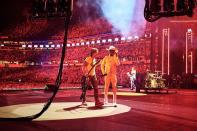 Keith Urban and Lil Nas X <a href="https://people.com/country/keith-urban-lil-nas-x-billy-ray-cyrus-old-town-road-cma-fest/" rel="nofollow noopener" target="_blank" data-ylk="slk:perform;elm:context_link;itc:0;sec:content-canvas" class="link ">perform</a> with Billy Ray Cyrus during day 3 of the 2019 CMA Music Festival in Nashville on Saturday.