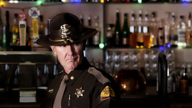 Utah Highway Patrol Maj.Steve Salas stands inside Bar X during a press conference urging drivers to add a sober ride to their winter holiday plans in Salt Lake City on Thursday, Dec. 14, 2023.